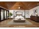 Virtual Rendering: Bedroom boasting a wooden ceiling, a four-poster bed and ample natural light at 1800 Melfi Ct, Henderson, NV 89012