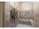 Luxurious steam room boasts a tile surround, built-in bench, and a state-of-the-art steam generator at 1800 Melfi Ct, Henderson, NV 89012