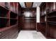 Walk-in closet with ample storage space and custom shelving units at 1800 Melfi Ct, Henderson, NV 89012