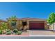Charming single-story home with landscaped front yard, brick driveway, and a red-tiled roof at 4333 Glossier Ave, North Las Vegas, NV 89084