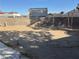 A spacious backyard offers a blank canvas for outdoor landscaping with perimeter block wall at 5157 New Bedford Dr, Las Vegas, NV 89122