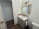 Updated bathroom featuring a modern vanity, stylish lighting, and tile backsplash at 5157 New Bedford Dr, Las Vegas, NV 89122