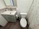 Renovated bathroom featuring a modern vanity, toilet, and decorative shower curtain at 5157 New Bedford Dr, Las Vegas, NV 89122