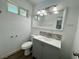Updated bathroom featuring a modern vanity and decorative mirror at 5157 New Bedford Dr, Las Vegas, NV 89122