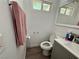 Bathroom featuring toilet, towel rack, and modern vanity at 5157 New Bedford Dr, Las Vegas, NV 89122