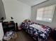 Bedroom featuring a twin bed, window, and closet at 5157 New Bedford Dr, Las Vegas, NV 89122