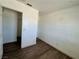 This room features a wood-look floor and white walls for a bright, simple feel at 5157 New Bedford Dr, Las Vegas, NV 89122