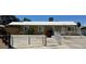 Charming single-story home featuring a new roof, white fence and desert landscaping at 5157 New Bedford Dr, Las Vegas, NV 89122