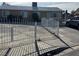 Home featuring a white fence and secure gated parking at 5157 New Bedford Dr, Las Vegas, NV 89122