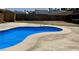 Backyard pool with desert landscaping and privacy fencing at 5157 New Bedford Dr, Las Vegas, NV 89122