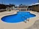 Inviting backyard pool with a calming blue finish, surrounded by a concrete deck at 5157 New Bedford Dr, Las Vegas, NV 89122