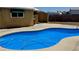 Enjoy this backyard oasis with a sparkling in-ground pool, ideal for relaxation and recreation at 5157 New Bedford Dr, Las Vegas, NV 89122