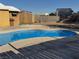 A refreshing pool for outdoor living and relaxation with adjacent landscaping adding aesthetic appeal at 5157 New Bedford Dr, Las Vegas, NV 89122