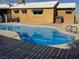 A sparkling pool and adjacent landscaping offering endless summer fun for outdoor living and relaxation at 5157 New Bedford Dr, Las Vegas, NV 89122