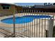 Backyard swimming pool is fenced in for safety and privacy at 5157 New Bedford Dr, Las Vegas, NV 89122