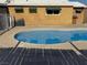 A sparkling pool and adjacent landscaping offering endless summer fun for outdoor living and relaxation at 5157 New Bedford Dr, Las Vegas, NV 89122