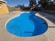 Overhead view of backyard pool with clean water and ample patio space at 5157 New Bedford Dr, Las Vegas, NV 89122