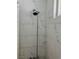 Shower features rainfall shower head and marble tiling at 5157 New Bedford Dr, Las Vegas, NV 89122