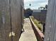 Side yard with cinder block fence and potential for customization at 5157 New Bedford Dr, Las Vegas, NV 89122