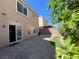 Backyard featuring a paved patio, brick walls and low maintenance landscaping at 6020 Arbor Downs Ave, Las Vegas, NV 89139