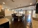 Stylish kitchen island with bar seating, pendant lights, and stainless steel appliances at 6020 Arbor Downs Ave, Las Vegas, NV 89139