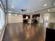 Bright and airy open-concept living room with hardwood floors and modern finishes at 6020 Arbor Downs Ave, Las Vegas, NV 89139