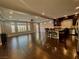 Open concept space with hardwood floors, recessed lighting, and large windows at 6020 Arbor Downs Ave, Las Vegas, NV 89139