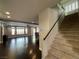 Inviting living area with staircase, and an open floor plan at 6020 Arbor Downs Ave, Las Vegas, NV 89139