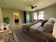 Comfortable main bedroom with neutral paint, soft carpet, ceiling fan and wardrobe at 6020 Arbor Downs Ave, Las Vegas, NV 89139