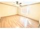 Large bedroom featuring wood floors, a ceiling fan, and a bright window at 8101 W Flamingo Rd # 1044, Las Vegas, NV 89147