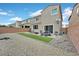 Landscaped backyard with a covered patio and desert-friendly design at 8919 Don Valley Ave, Las Vegas, NV 89148