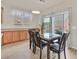 Dining area features granite countertops and sliding door to outdoor patio at 8919 Don Valley Ave, Las Vegas, NV 89148