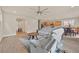 Open living room featuring wood floors and a ceiling fan at 8919 Don Valley Ave, Las Vegas, NV 89148