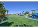 Expansive green community park offers playground, picnic shelter and is surrounded by beautiful homes and landscaping at 8919 Don Valley Ave, Las Vegas, NV 89148