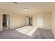 Bright bedroom with multiple doors, creating seamless flow and access throughout the space at 9737 Toad Hollow St, Las Vegas, NV 89141