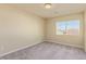 Well-lit bedroom with ample space and a view, offering a comfortable and inviting atmosphere at 9737 Toad Hollow St, Las Vegas, NV 89141