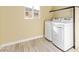 Functional laundry room with modern appliances and ample space for organization at 9737 Toad Hollow St, Las Vegas, NV 89141
