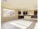 Spacious open-concept room adjacent to the kitchen and with large window at 9737 Toad Hollow St, Las Vegas, NV 89141