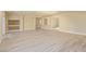 Spacious living room with open floor plan, showcasing the light-colored walls and modern flooring at 9737 Toad Hollow St, Las Vegas, NV 89141