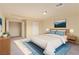 Bright main bedroom with neutral colors and a walk-in closet, creating a peaceful and inviting retreat at 9737 Toad Hollow St, Las Vegas, NV 89141
