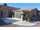 The backyard features a covered screen patio and mature landscaping, offering a private outdoor oasis at 9904 Arbuckle Dr, Las Vegas, NV 89134