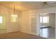 Dining room featuring neutral walls, carpet, and a decorative chandelier above at 9904 Arbuckle Dr, Las Vegas, NV 89134