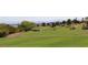 Expansive golf course showcasing lush greenery and well-placed sand traps at 9904 Arbuckle Dr, Las Vegas, NV 89134