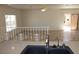 Kitchen with light countertops and a central island with a sink overlooking a dining area at 9904 Arbuckle Dr, Las Vegas, NV 89134