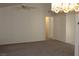 Large living room featuring neutral walls and carpet at 9904 Arbuckle Dr, Las Vegas, NV 89134