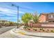 Entrance to Hampton Glen at Providence features a gated entry and landscaped grounds at 10509 Hartford Hills Ave, Las Vegas, NV 89166