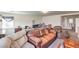 Spacious living area with multiple seating options, great for relaxing and entertaining friends and Gathering at 10509 Hartford Hills Ave, Las Vegas, NV 89166