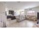 View of the kitchen and living space in an open floor plan home with tile flooring at 10509 Hartford Hills Ave, Las Vegas, NV 89166