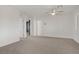Spacious bedroom with multiple doors and neutral colored carpet at 1103 Tektite Ave, Henderson, NV 89011