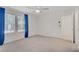Bright bedroom with large windows and modern blue curtains at 1103 Tektite Ave, Henderson, NV 89011
